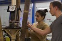 One of the students installs the electronic components in the structure of the 'Bam-Boo' kiosk.