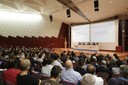 Imagen general de los asistentes al acto, durante la intervención del secretario de Universidades e Investigación de la Generalitat de Catalunya, Arcadi Navarro